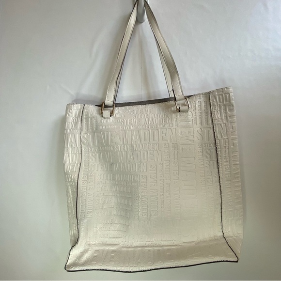 *Free w/Purchase*Steve Madden White Embossed Travel Take Along Tote Earbud Case - Picture 2 of 15